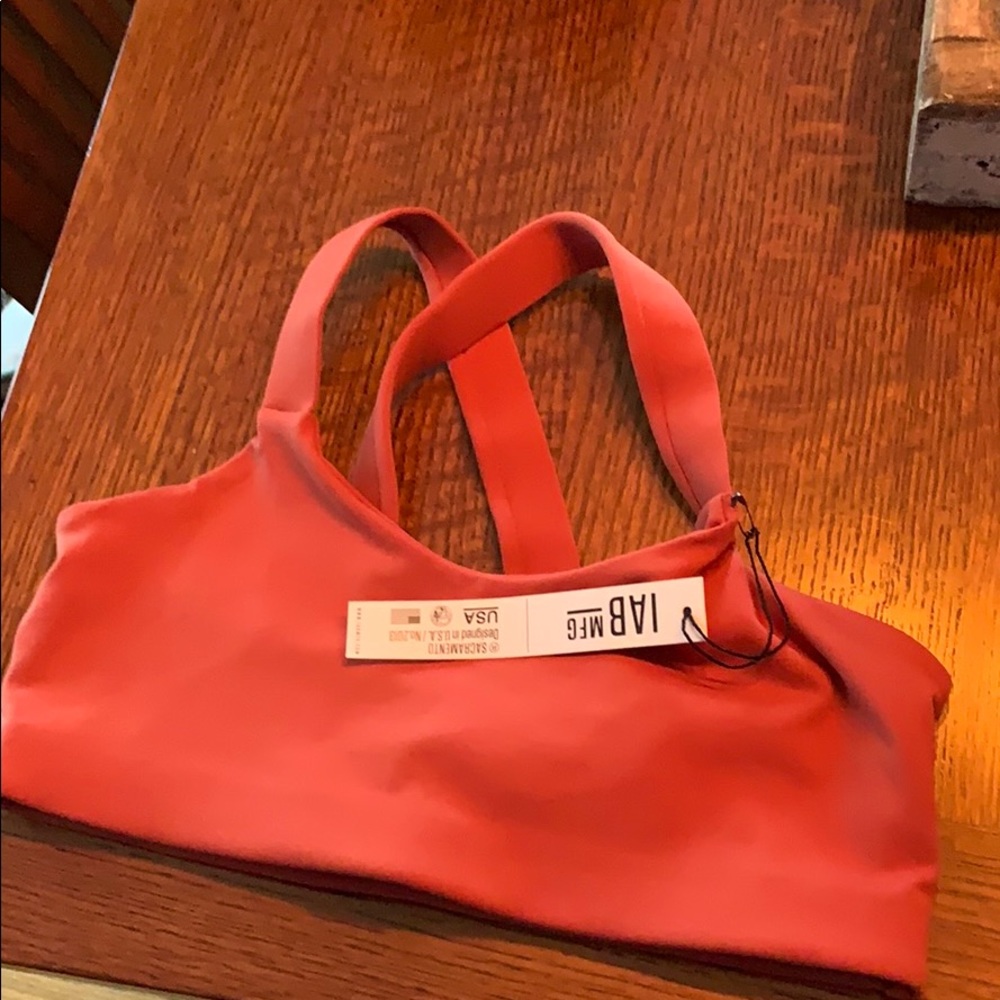 IAMBECOMING sports bra. Dark orange. NWT